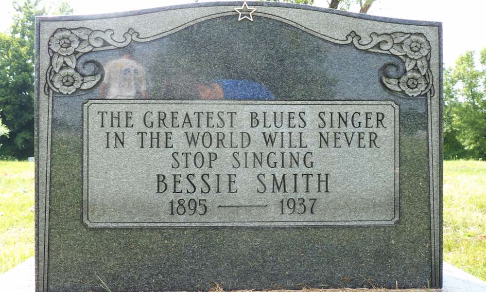 Bessie Smith’s gravestone, marked “The Greatest Blues Singer In The World Will Never Stop Singing”