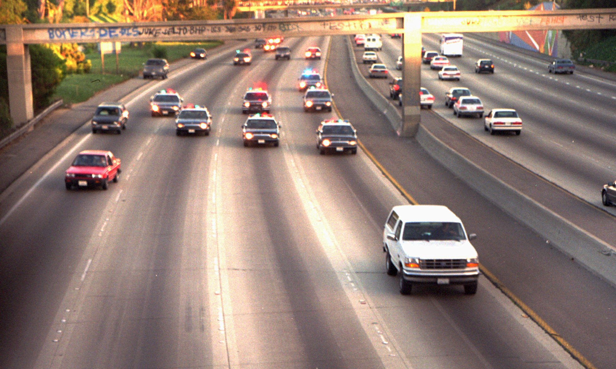 O.J. Simpson in his white, Ford Bronco being “chased” (at rather low speed) by the Los Angeles Police on June 17, 1993