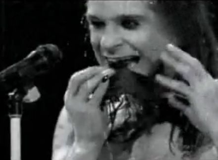 Ozzy Osbourne having a bite on stage, January 20, 1982