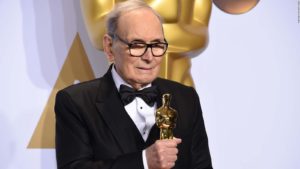 Ennio Morricone on February 28, 2016, holding his Oscar for the soundtrack to Quentin Tarantino’s The Hateful Eight