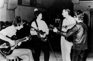 The Beatles and George Martin in the Abbey Road studio, London, in 1966