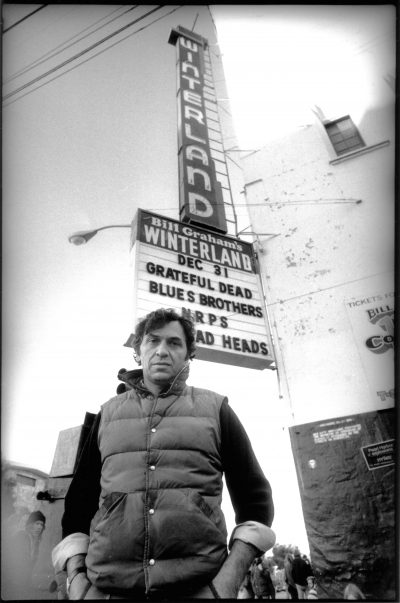 Bill Graham (1931-1991) in front of the Winterland Ballroom, San Francisco