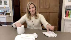 Sheryl Crowe demonstrating (wastefully demonstrating!) how to properly employ toilet paper