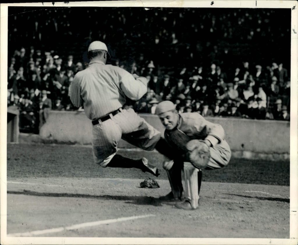 Cobb sliding spikes-high into St. Louis Browns catcher Paul Krichell in 1912